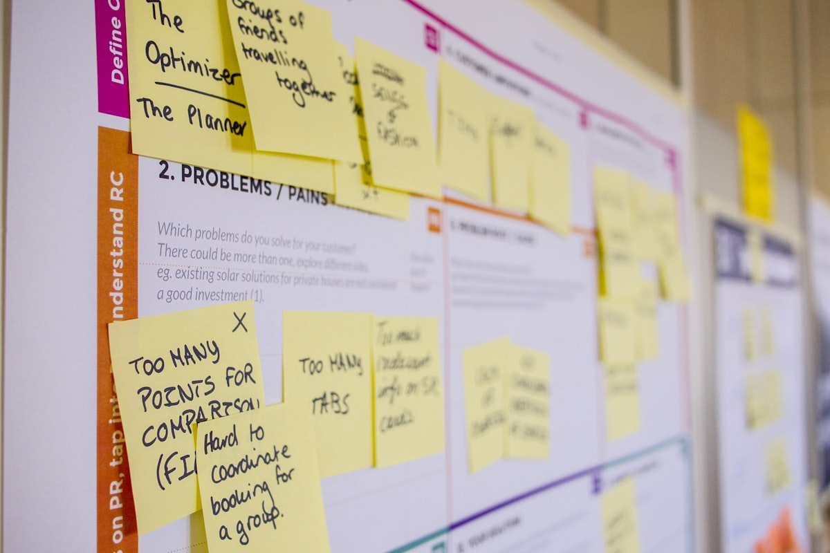 Colourful sticky notes on a Kanban board
